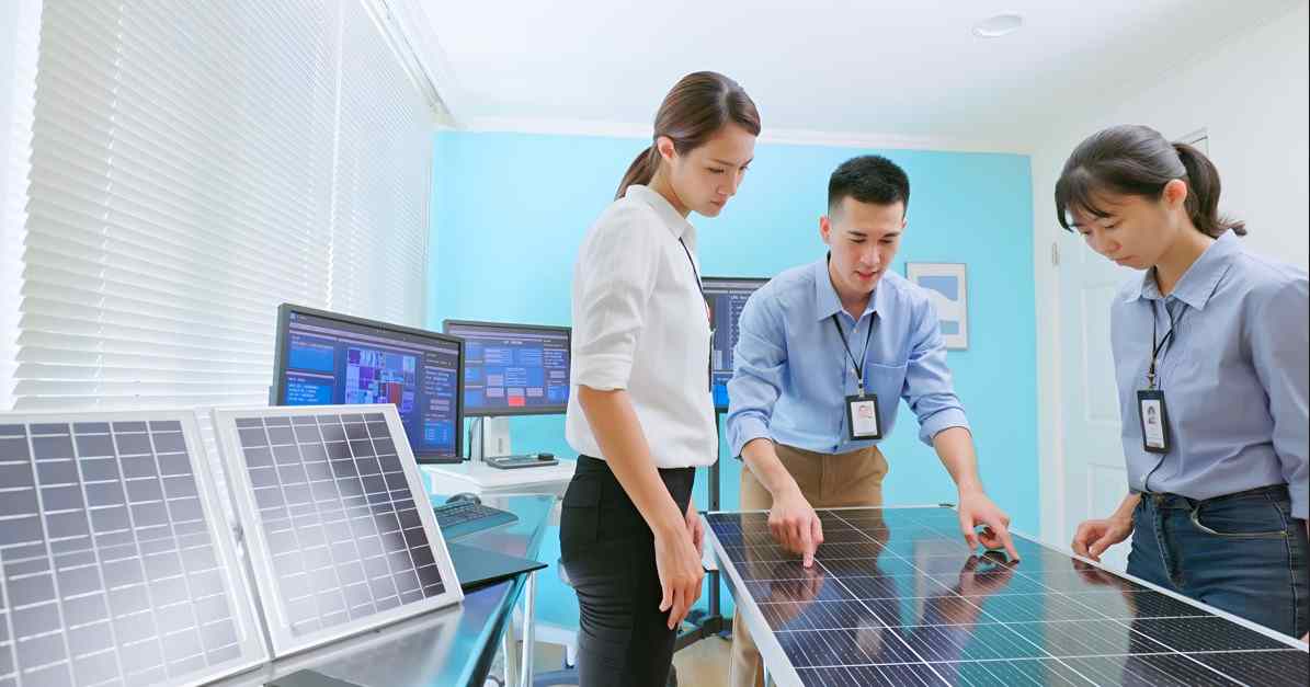 Engineers looking at solar panel